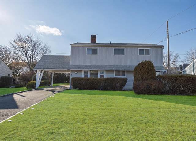 Property at 12 Springtime Ln E, Levittown, NY 11756, 4 beds, 2 baths