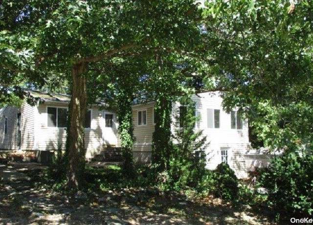 Property at 70 Beech St, Lake Grove, NY 11755, 4 beds, 2 baths