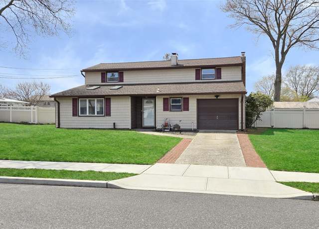 Property at 12 Majestic Rd, Selden, NY 11784, 4 beds, 2 baths