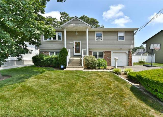 Property at 1317 Taft Ave, Merrick, NY 11566, 5 beds, 3 baths