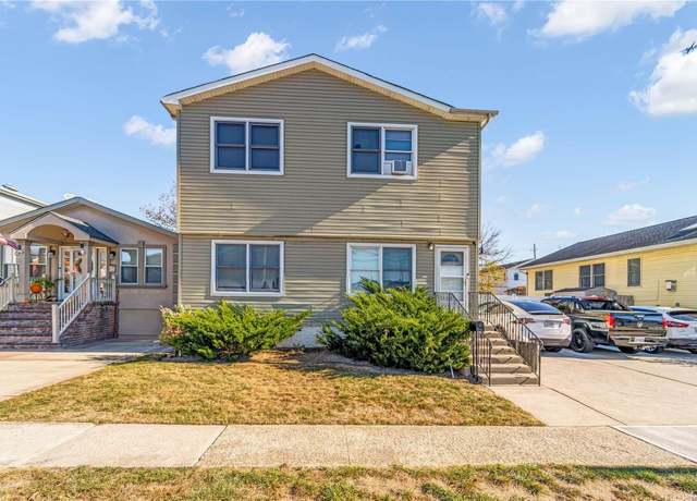 Property at 135 Radcliffe Rd, Island Park, NY 11558, 6 beds, 2 baths