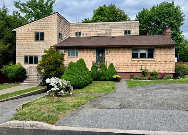 Property at 7 Oak St, Elmsford, NY 10523, 4 beds, 3 baths