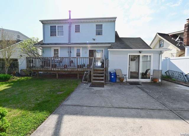 Property at 3299 Fourth St, Oceanside, NY 11572, 4 beds, 2 baths