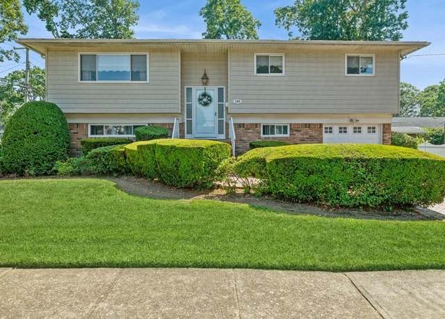 Property at 180 Cypress St, Massapequa Park, NY 11762, 4 beds, 2 baths