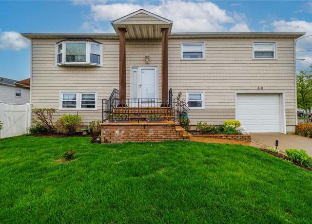 Property at 68 Lincoln Ave, Island Park, NY 11558, 4 beds, 2.5 baths