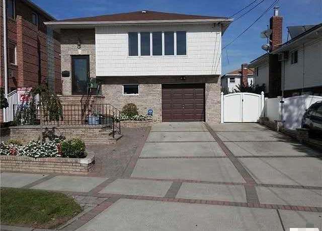 Property at 91-11 163 Ave, Howard Beach, NY 11414, 4 beds, 3 baths