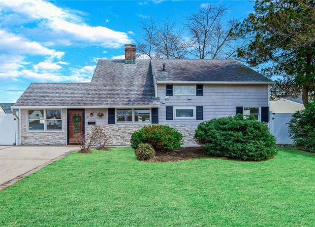 Property at 25 Lotus Ln, Westbury, NY 11590, 5 beds, 2 baths