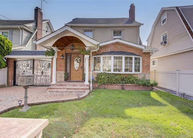 Property at 92-24 218 St, Queens Village, NY 11428, 3 beds, 3 baths