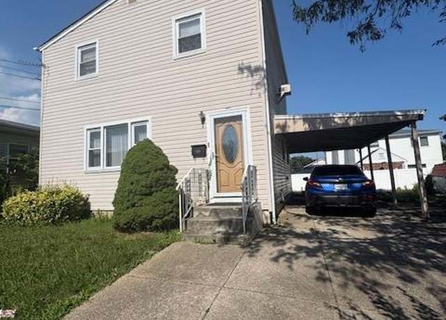 Property at 220 Elzy Ave, Elmont, NY 11003, 4 beds, 2 baths