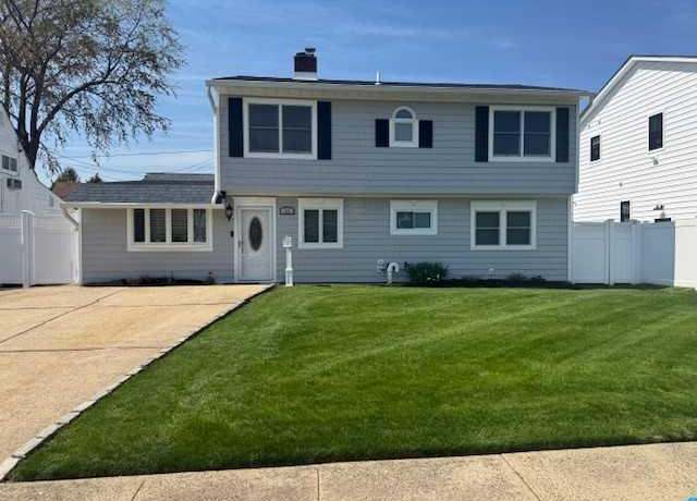 Property at 18 Prince Ln, Westbury, NY 11590, 5 beds, 2 baths