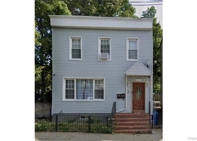 Property at 14-21 121 St, College Point, NY 11356, 4 beds, 2 baths