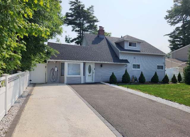 Property at 111 Blacksmith Rd E, Levittown, NY 11756, 4 beds, 2 baths