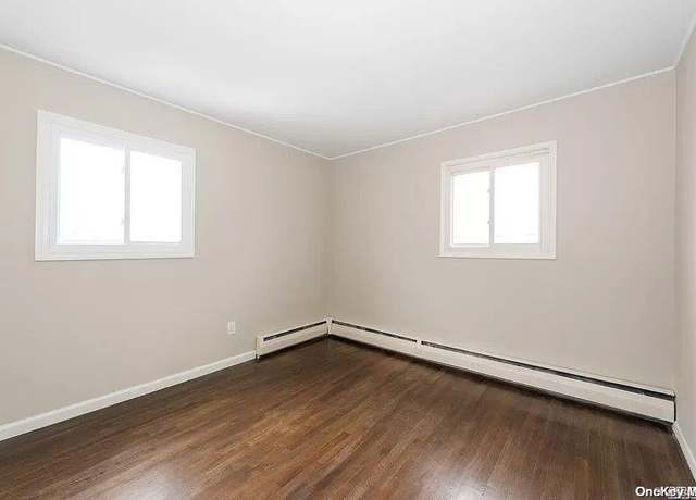 Property at 587 S Bayview Ave, Freeport, NY 11520, 4 beds, 2 baths