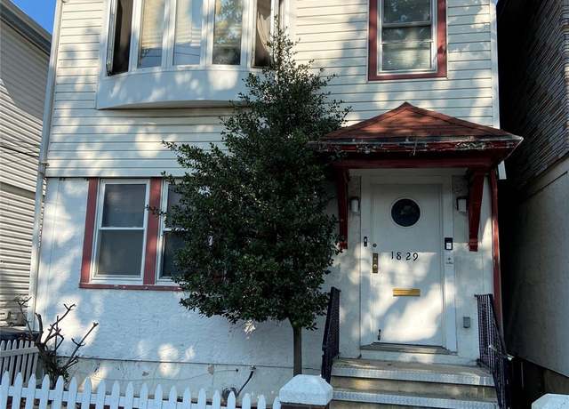 Property at 18-29 129 St, College Point, NY 11356, 6 beds, 2 baths