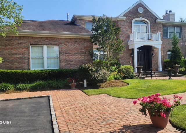 Property at 12 Caumsett Farms Ln, Woodbury, NY 11797, 7 beds, 4.5 baths