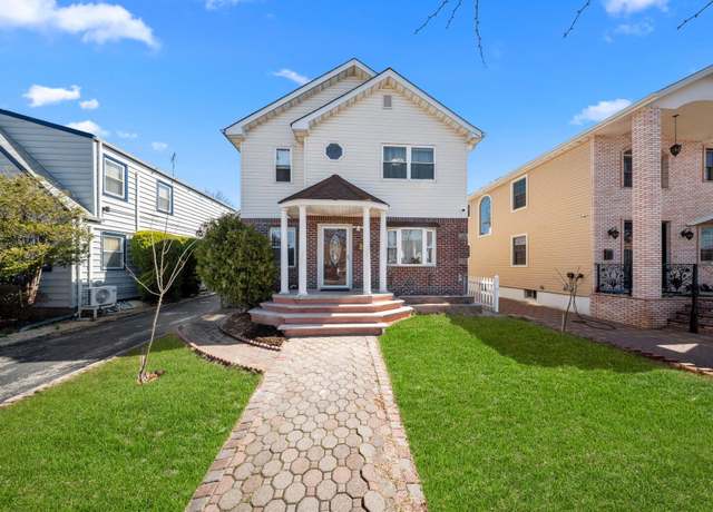 Property at 79-31 Langdale St, New Hyde Park, NY 11040, 5 beds, 3 baths