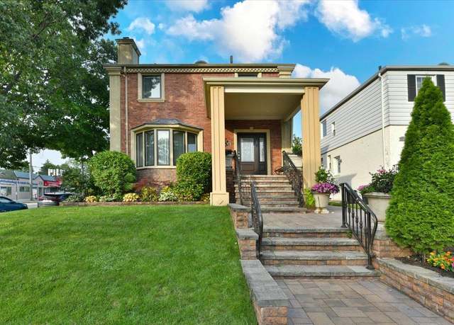 Property at 80-03 192nd St, Jamaica Estates, NY 11423, 3 beds, 3.5 baths