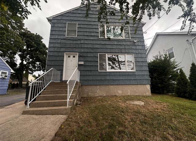 Property at 21 Elm St, Greenvale, NY 11548, 4 beds, 3 baths