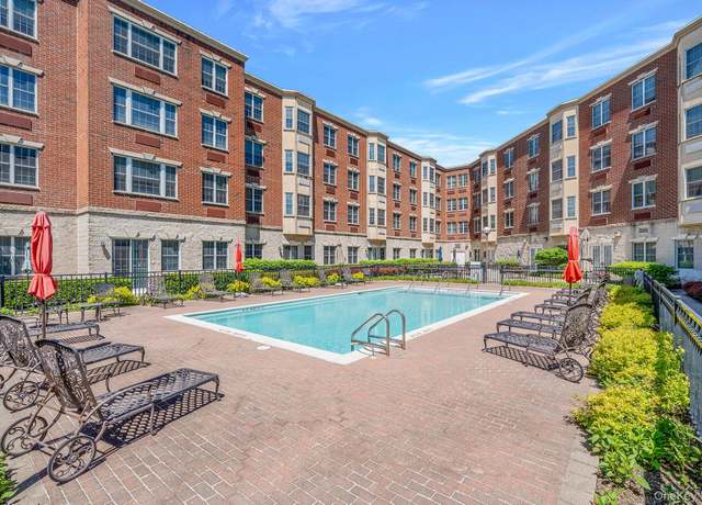 Property at 50 Merrick Ave #216, East Meadow, NY 11554, 2 beds, 2 baths