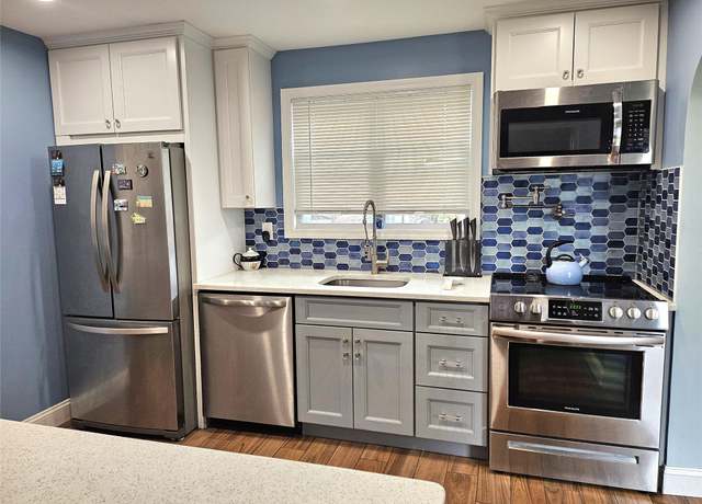 Property at 132-29 Brookville Blvd, Rosedale, NY 11422, 4 beds, 2 baths