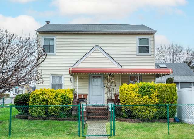 Property at 130 Franklin St, Elmont, NY 11003, 4 beds, 2 baths
