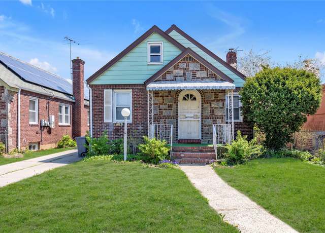 Property at 11651 230th St, Cambria Heights, NY 11411, 4 beds, 2 baths
