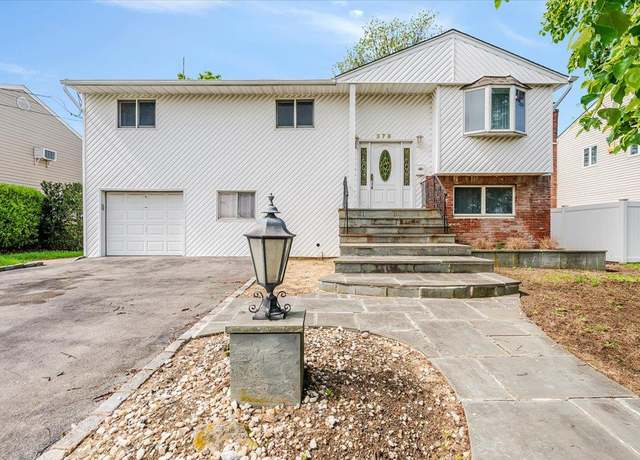 Property at 378 W Waukena Ave, Oceanside, NY 11572, 5 beds, 3 baths