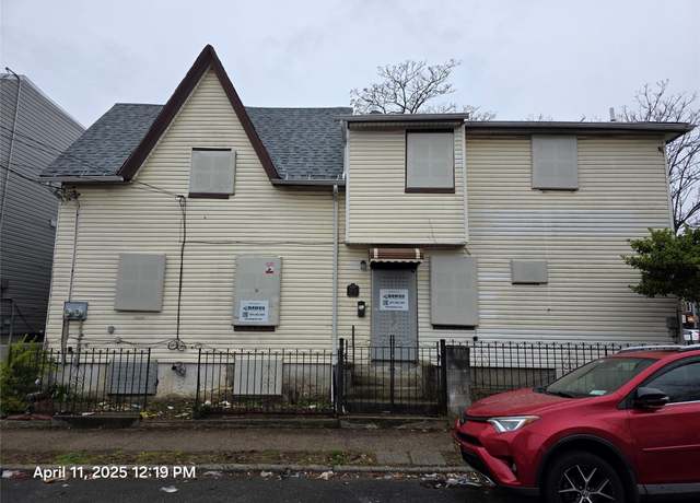 Property at 11110 153rd St, Jamaica, NY 11433, 4 beds, 2 baths