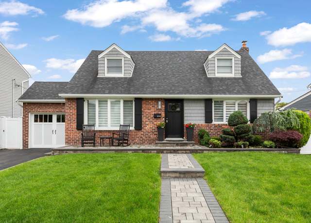 Property at 1696 Coral Rd, East Meadow, NY 11554, 4 beds, 2 baths