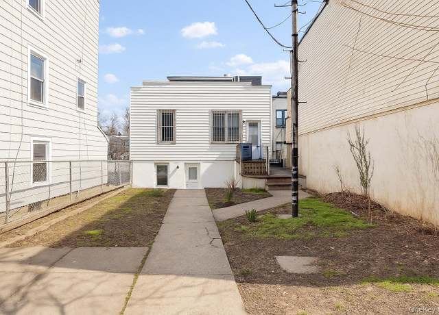 Property at 36-13 10th St, Astoria, NY 11106, 4 beds, 2 baths