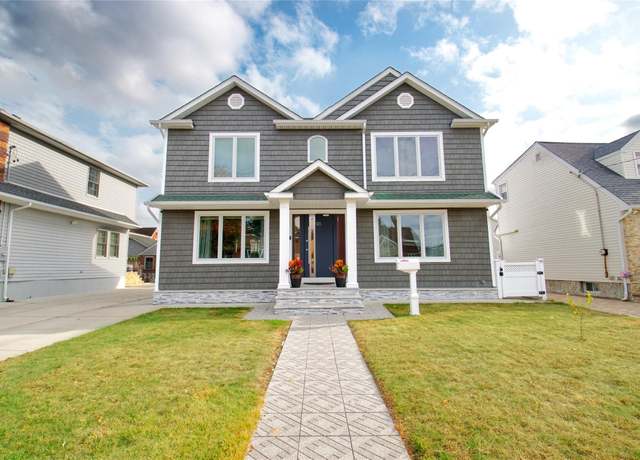Property at 48 2nd St, New Hyde Park, NY 11040, 4 beds, 3 baths