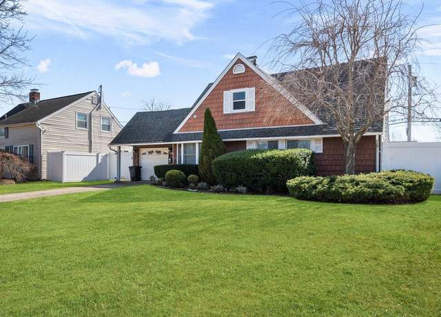 Property at 62 Polaris Dr, Levittown, NY 11756, 4 beds, 2 baths