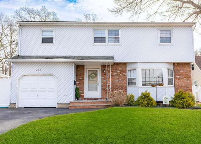 Property at 120 Erlanger Blvd, North Babylon, NY 11703, 4 beds, 2.5 baths