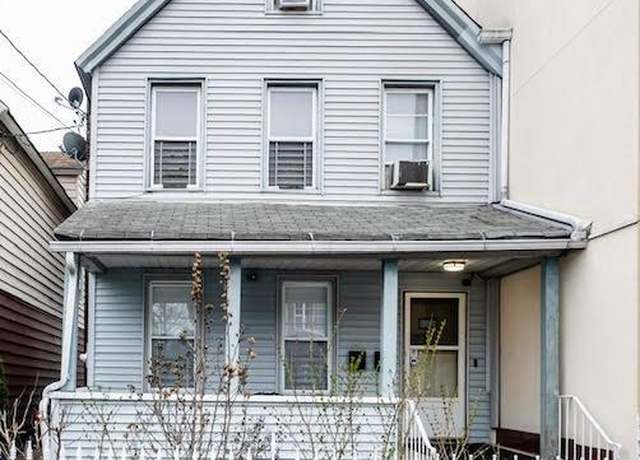 Property at 101-14 95th St, Ozone Park, NY 11416, 5 beds, 2 baths