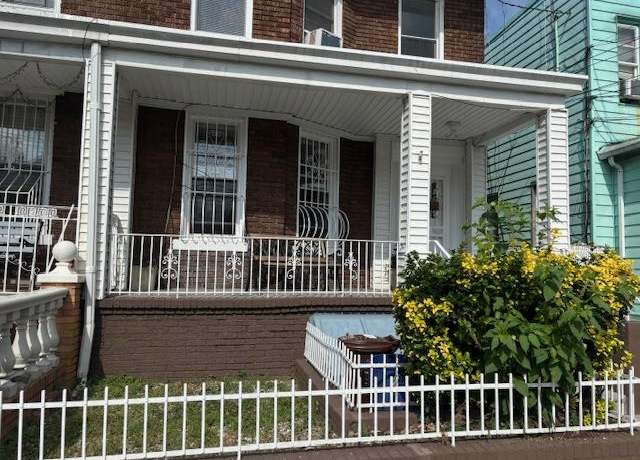 Property at 9018 77th St, Woodhaven, NY 11421, 7 beds, 3 baths