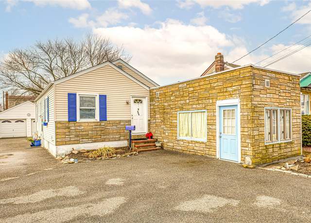 Property at 644 Merrick Rd, Copiague, NY 11726, 3 beds, 1.5 baths