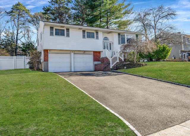 Property at 105 Morewood Dr, Smithtown, NY 11787, 4 beds, 2 baths