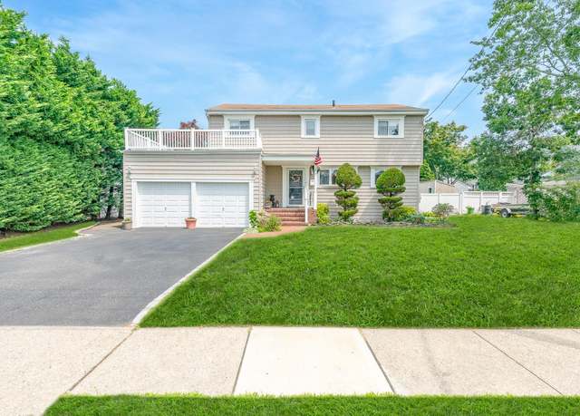 Property at 49 Iroquois St E, Massapequa, NY 11758, 4 beds, 2 baths