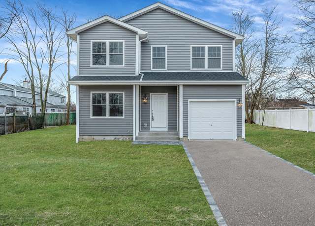 Property at 9 Okane St, Central Islip, NY 11722, 4 beds, 2.5 baths