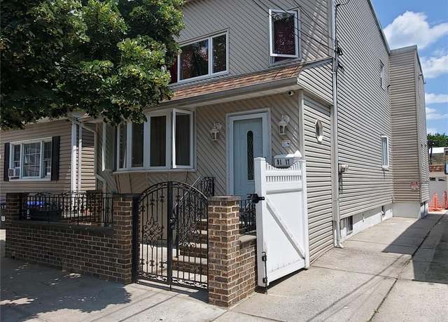 Property at 91-17 78th St, Woodhaven, NY 11421, 4 beds, 2 baths