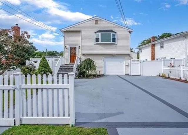 Property at 535 Molloy St, Copiague, NY 11726, 5 beds, 3 baths