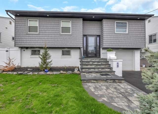 Property at 48 E 2nd St, Freeport, NY 11520, 4 beds, 2 baths