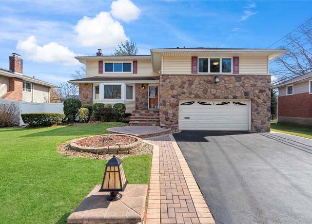 Property at 1 Stuart Dr, Syosset, NY 11791, 4 beds, 3 baths