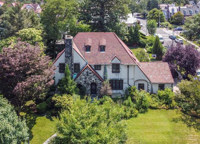 Property at 55 Exeter St, Forest Hills, NY 11375, 5 beds, 4 baths