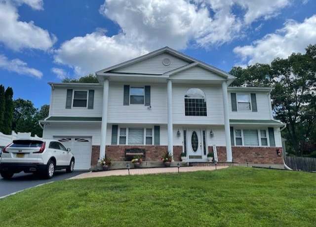 Property at 11 Dillmont Dr, Smithtown, NY 11787, 4 beds, 2.5 baths