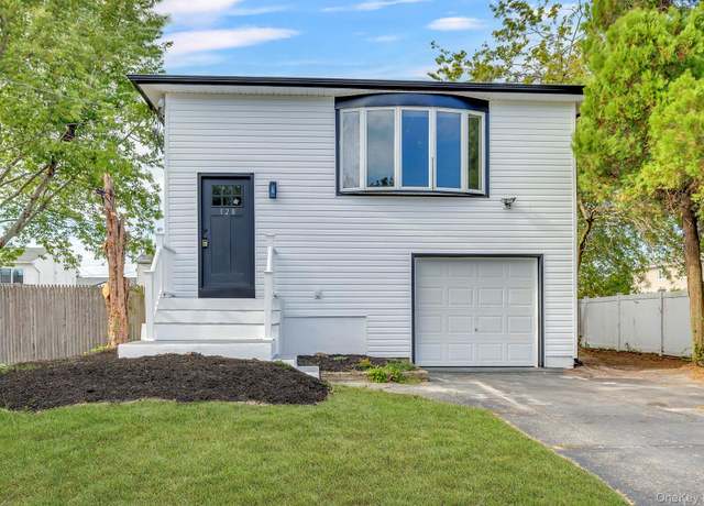 Property at 128 Spring St, Massapequa, NY 11758, 6 beds, 2 baths