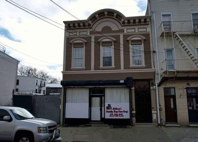 Property at 92-08 95th Ave, Ozone Park, NY 11416, 4 beds, 2 baths