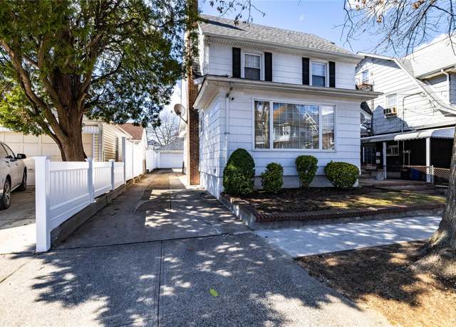Property at 10540 92nd St, Ozone Park, NY 11417, 4 beds, 1.5 baths