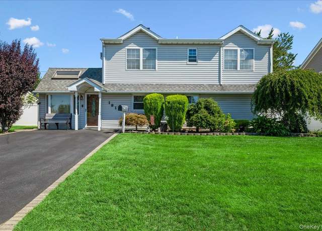 Property at 181 Springtime Ln N, Levittown, NY 11756, 4 beds, 2 baths