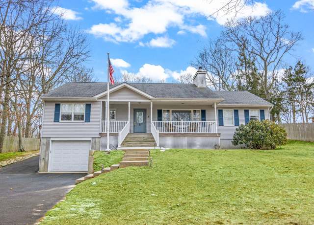 Property at 8 Rolling Woods Ln, Hampton Bays, NY 11946, 3 beds, 2 baths